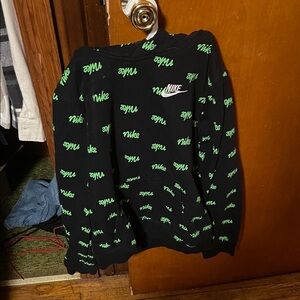 Nike Boys Sweater in Black with Green Logo Pattern